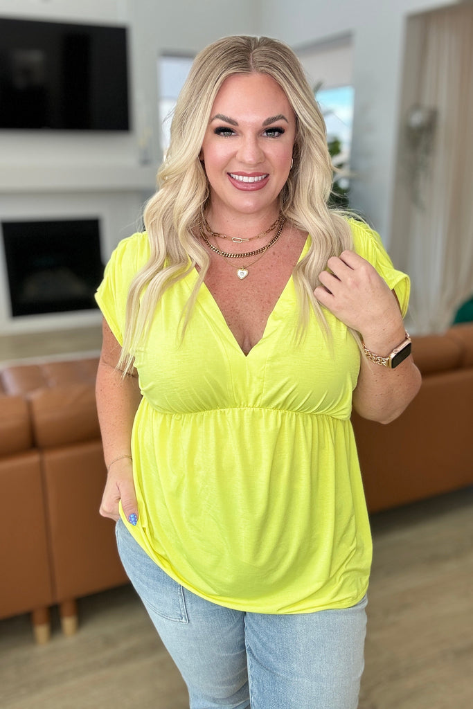 Rhea Peplum Top in Neon Yellow-Tops-Timber Brooke Boutique, Online Women's Fashion Boutique in Amarillo, Texas