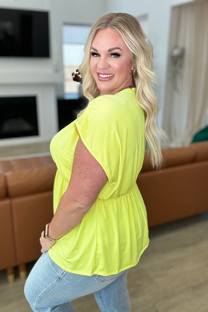 Rhea Peplum Top in Neon Yellow-Tops-Timber Brooke Boutique, Online Women's Fashion Boutique in Amarillo, Texas