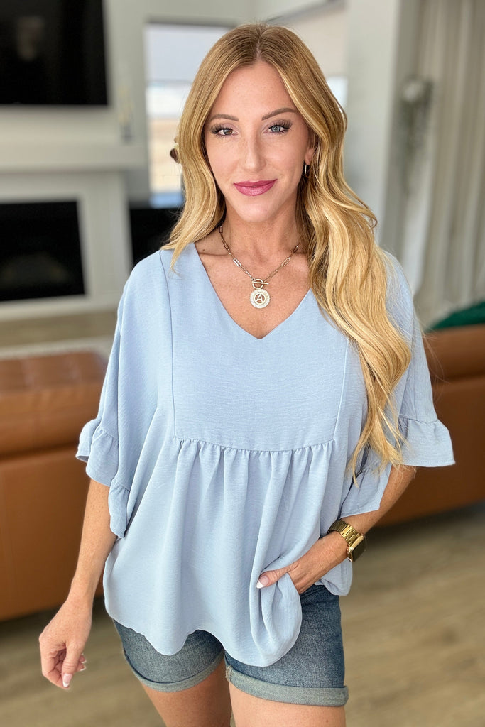 Airflow Peplum Ruffle Sleeve Top in Chambray-Tops-Timber Brooke Boutique, Online Women's Fashion Boutique in Amarillo, Texas