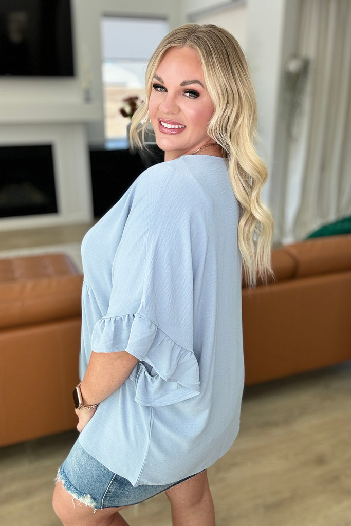 Airflow Peplum Ruffle Sleeve Top in Chambray-Tops-Timber Brooke Boutique, Online Women's Fashion Boutique in Amarillo, Texas