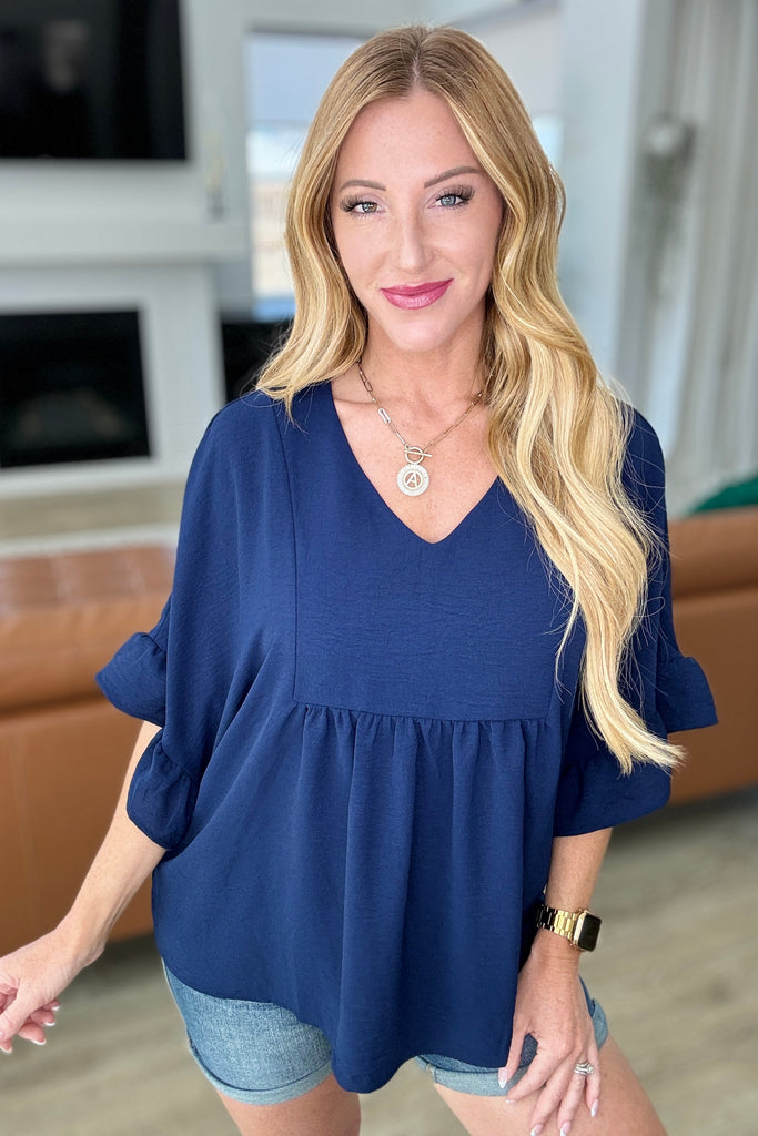 Airflow Peplum Ruffle Sleeve Top in Navy-Tops-Timber Brooke Boutique, Online Women's Fashion Boutique in Amarillo, Texas